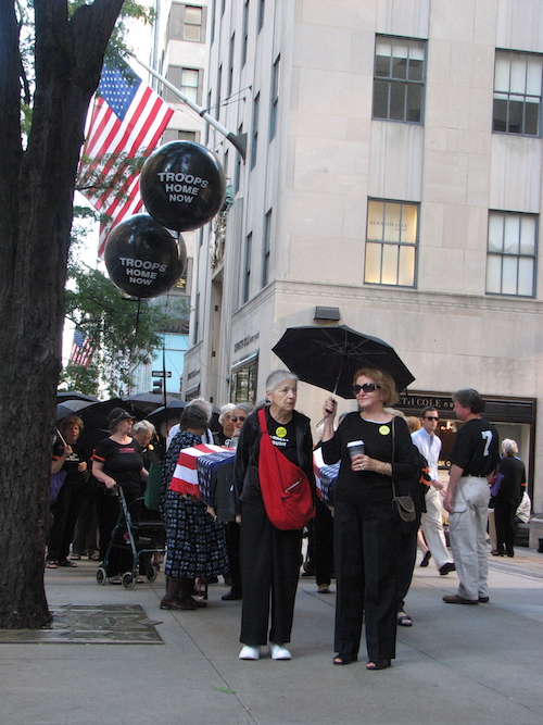 Grannies funeral march with black balloons