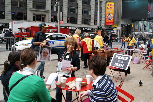 Ann Shirazi talking to tourists in Times Square